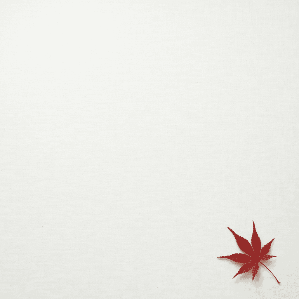 Una composición minimalista con una sola hoja de arce rojo delicada…